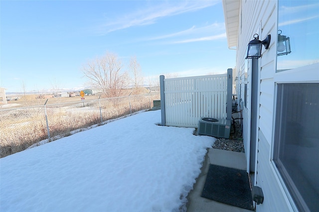 view of yard featuring fence and cooling unit