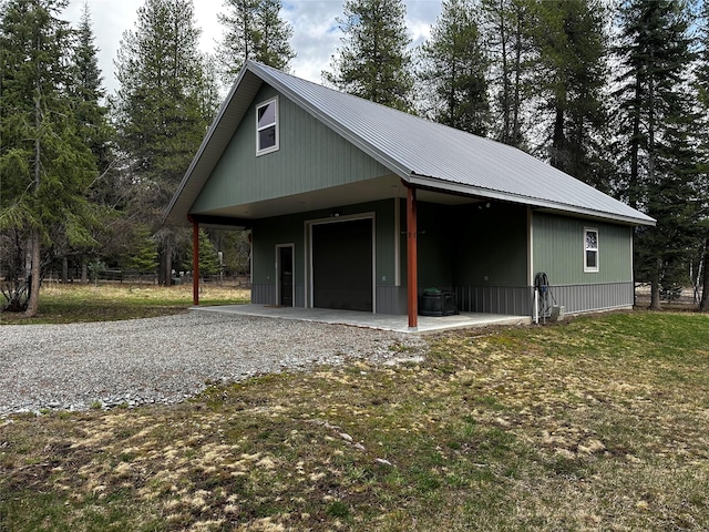 22 Pinewoods Dr, Trout Creek, MT 59874 - garage featuring gravel driveway