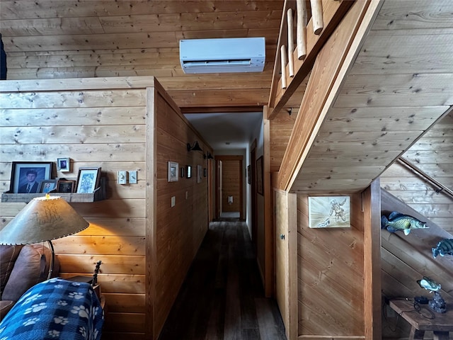 hallway with wood walls and a wall unit AC