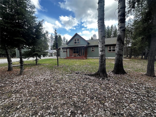 22 Pinewoods Dr, Trout Creek, MT 59874 - bungalow-style home with covered porch