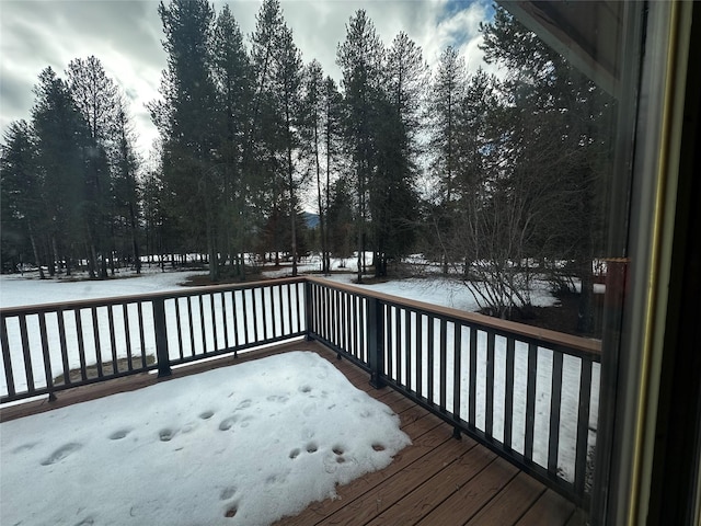 view of snow covered deck