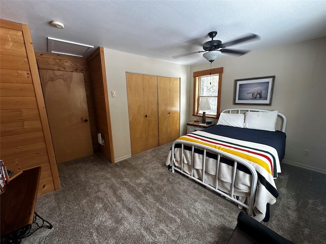 22 Pinewoods Dr, Trout Creek, MT 59874 - carpeted bedroom with attic access, a closet, ceiling fan, and a textured ceiling