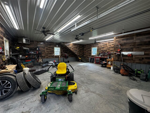 22 Pinewoods Dr, Trout Creek, MT 59874 - garage with a workshop area and ceiling fan