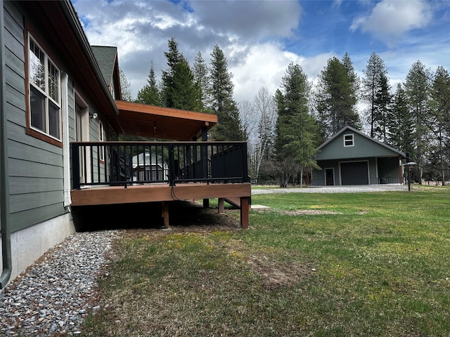 22 Pinewoods Dr, Trout Creek, MT 59874 - view of green lawn with a garage and a deck