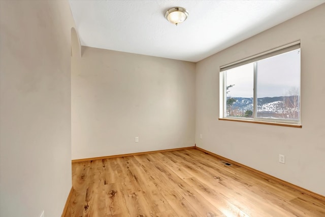 6864 Joy Dr, Missoula, MT 59803 - spare room with light wood-style floors and baseboards