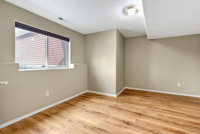 6864 Joy Dr, Missoula, MT 59803 - spare room featuring wood finished floors and baseboards