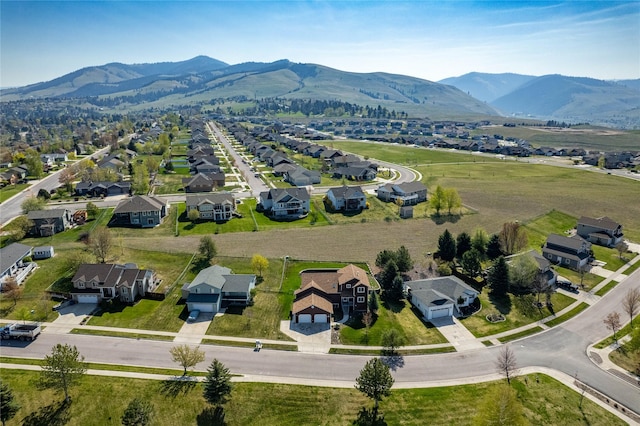 6864 Joy Dr, Missoula, MT 59803 - aerial perspective of suburban area featuring a mountain backdrop