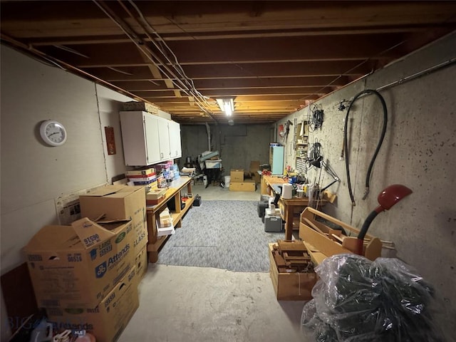 unfinished basement with water heater