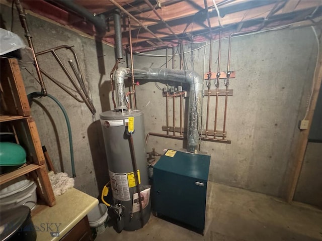 utility room featuring gas water heater