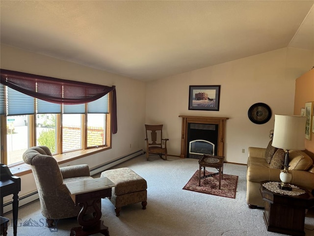 carpeted living area with vaulted ceiling, baseboards, baseboard heating, and a fireplace