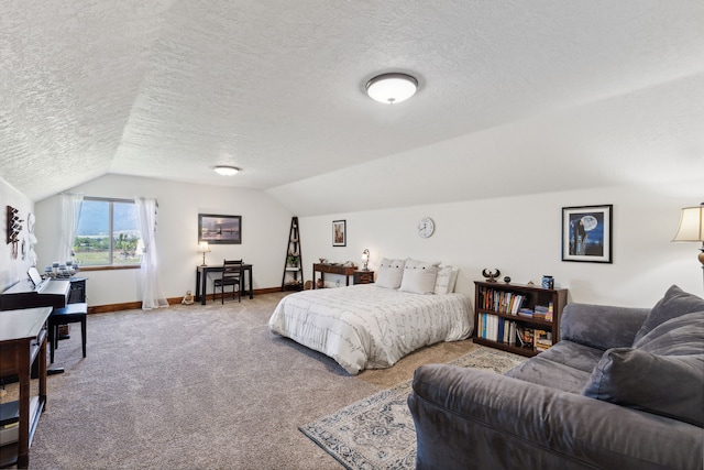 4416 Gem Ranch Rd, Stevensville, MT 59870 - bedroom featuring a textured ceiling, vaulted ceiling, and carpet