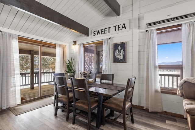 65637 Mt Highway 37, Eureka, MT 59917 - dining area with a wall mounted AC and wood finished floors