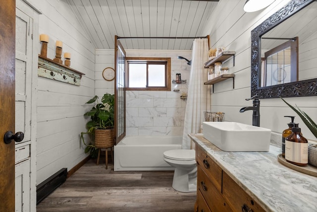 65637 Mt Highway 37, Eureka, MT 59917 - full bathroom featuring vanity, wood finished floors, shower / bath combo with shower curtain, and wooden walls
