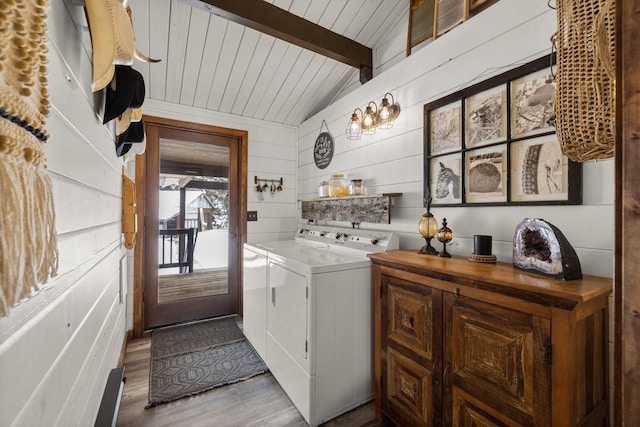 65637 Mt Highway 37, Eureka, MT 59917 - laundry area with washing machine and clothes dryer, wood finished floors, wood ceiling, and wood walls