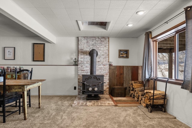 65637 Mt Highway 37, Eureka, MT 59917 - carpeted living room featuring a wood stove