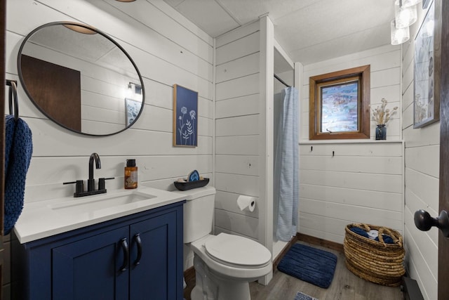 65637 Mt Highway 37, Eureka, MT 59917 - bathroom featuring wood finished floors, vanity, and a shower with curtain