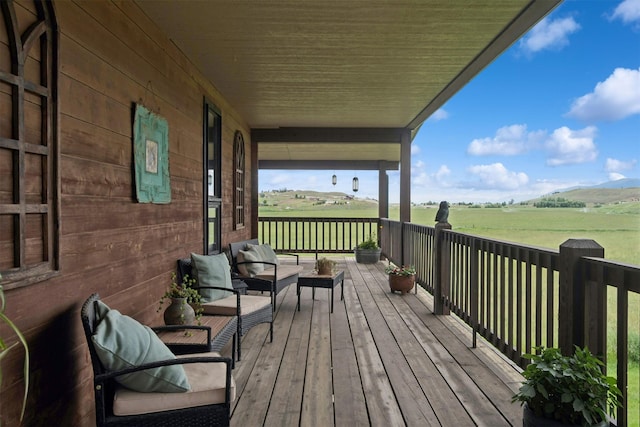 65637 Mt Highway 37, Eureka, MT 59917 - wooden deck with an outdoor hangout area
