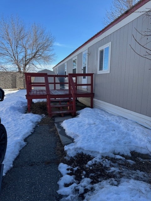 view of snow covered deck