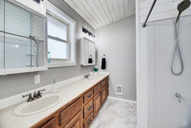 full bathroom featuring double vanity, visible vents, wooden ceiling, marble finish floor, and a sink