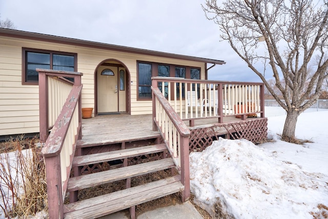 exterior space featuring a wooden deck