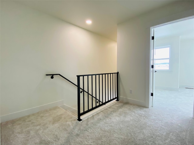 stairway with recessed lighting, carpet flooring, and baseboards