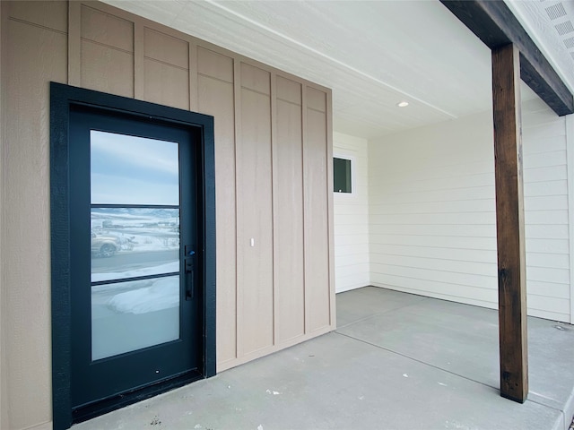 entrance to property with board and batten siding
