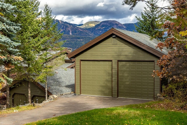 detached garage with a mountain view