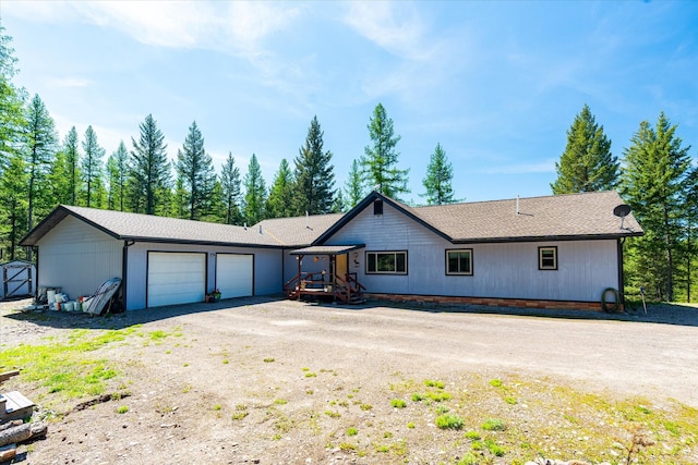 view of front of home with driveway and an attached garage