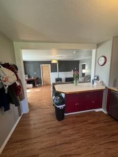 155 8th Ave, Kalispell, MT 59901 - kitchen with dark wood-style floors and a peninsula