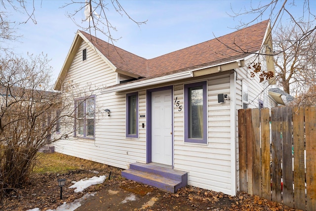 155 8th Ave, Kalispell, MT 59901 - rear view of house featuring roof with shingles