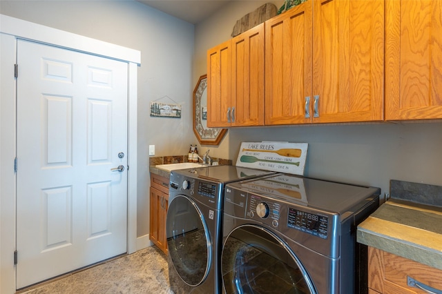 935 Pack Rat Ln, Whitefish, MT 59937 - laundry area with washing machine and clothes dryer and cabinet space