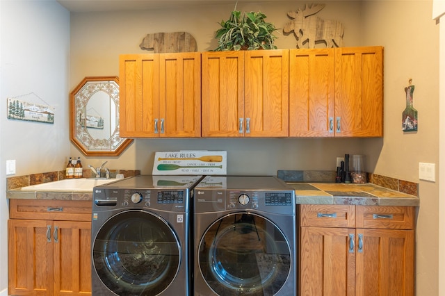 935 Pack Rat Ln, Whitefish, MT 59937 - laundry room with independent washer and dryer and cabinet space