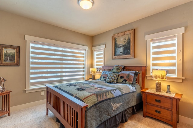 935 Pack Rat Ln, Whitefish, MT 59937 - bedroom featuring light colored carpet and baseboards