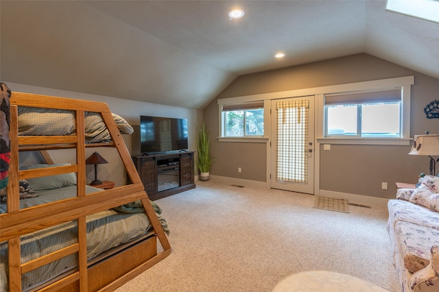 935 Pack Rat Ln, Whitefish, MT 59937 - carpeted bedroom with vaulted ceiling, baseboards, access to outside, and recessed lighting