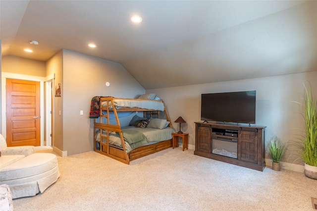 935 Pack Rat Ln, Whitefish, MT 59937 - carpeted bedroom with vaulted ceiling, recessed lighting, and baseboards