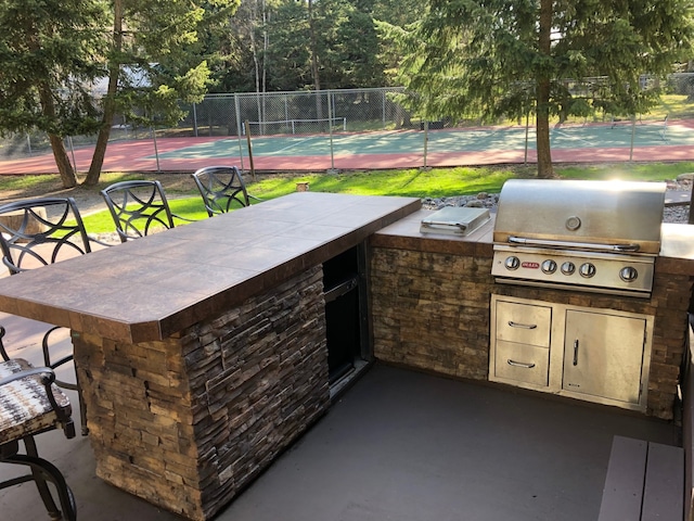 935 Pack Rat Ln, Whitefish, MT 59937 - view of patio / terrace featuring exterior bar