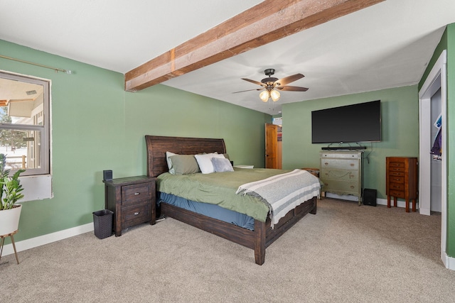 bedroom featuring carpet floors, beam ceiling, ceiling fan, and baseboards