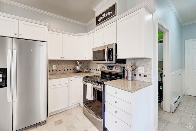 kitchen featuring appliances with stainless steel finishes, decorative backsplash, white cabinets, and crown molding