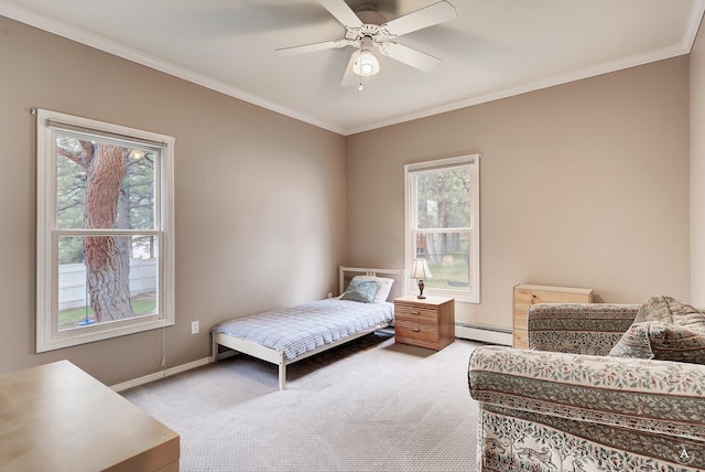 bedroom featuring light carpet, a baseboard heating unit, and crown molding