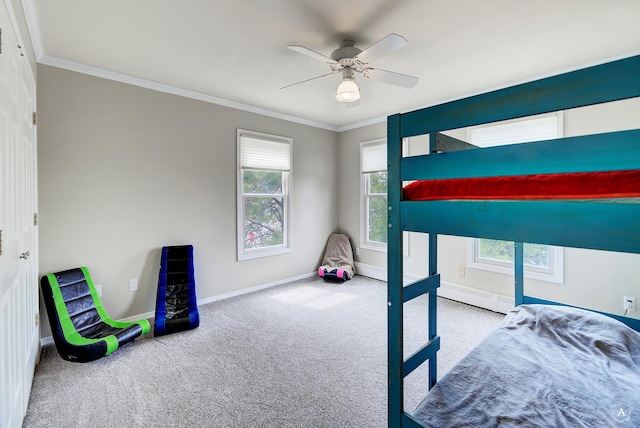 carpeted bedroom featuring baseboards, multiple windows, a ceiling fan, and crown molding