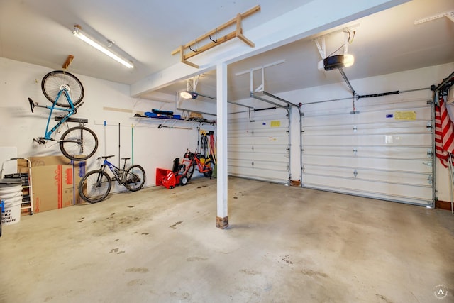 garage featuring a garage door opener