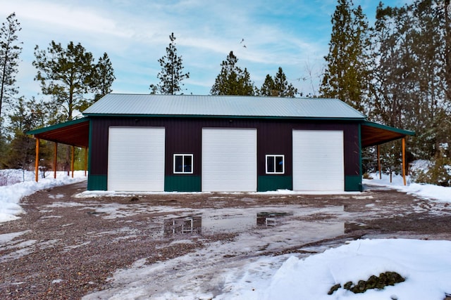 exterior space with a detached garage