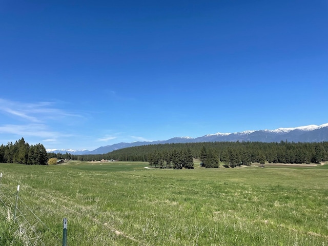 property view of mountains with a rural view