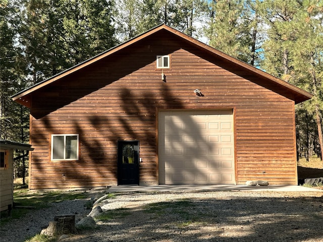 exterior space with a garage and driveway