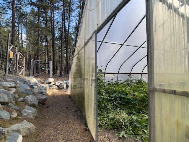 view of yard with an outbuilding and an exterior structure