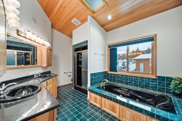 full bathroom featuring a stall shower, wooden ceiling, and a sink