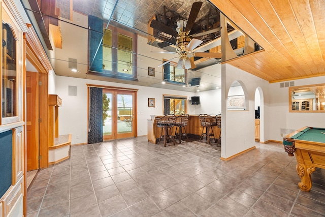 game room featuring visible vents, arched walkways, baseboards, ceiling fan, and pool table