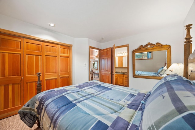 bedroom featuring recessed lighting, a closet, and connected bathroom