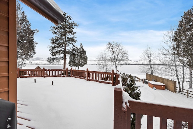 view of snow covered deck