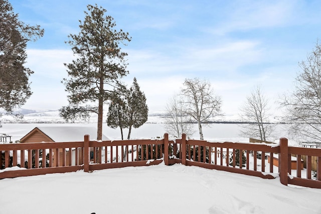 view of snow covered deck